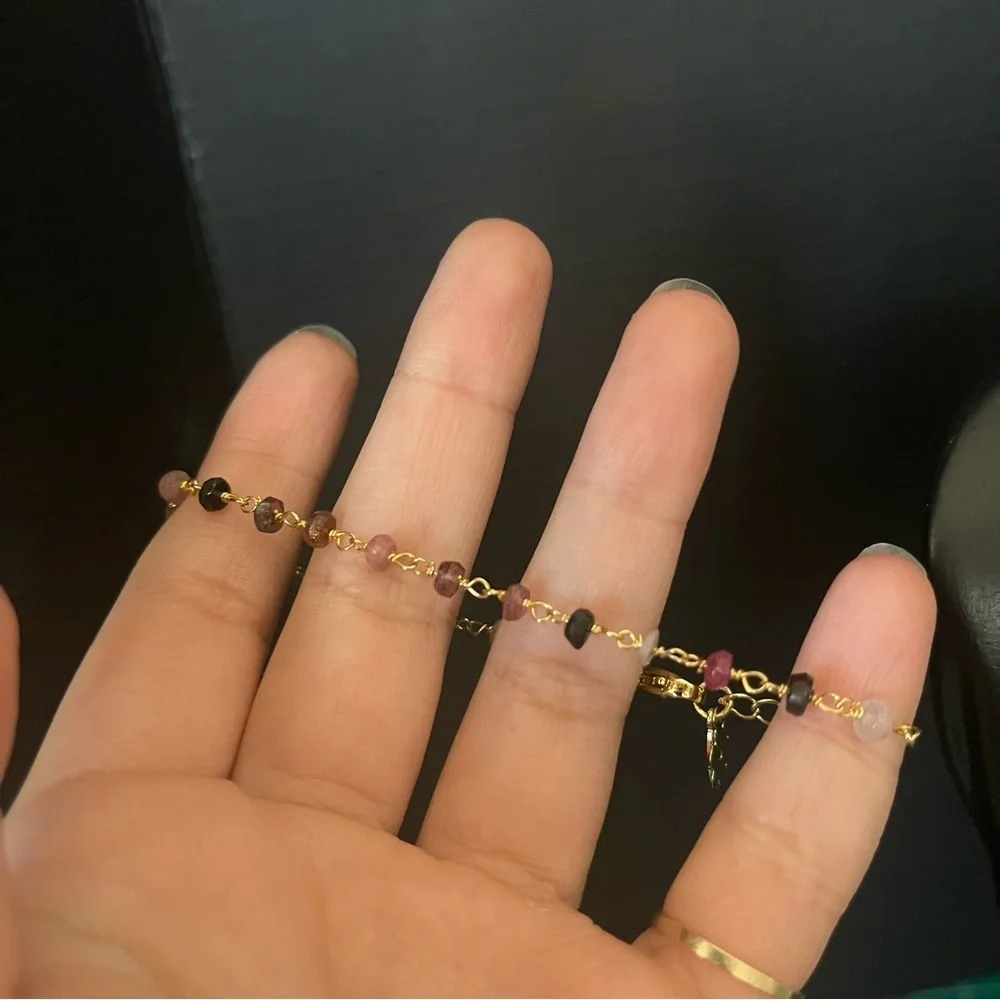 Gold tone crystal pink bird chain bead chain bracelet